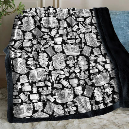 Plaid sur le canapé, dos sherpa noir